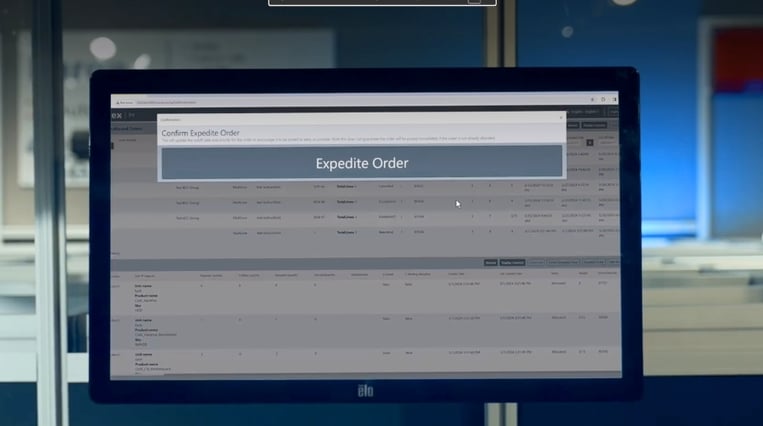 Laptop screen with Expedite Order button for AutoStore