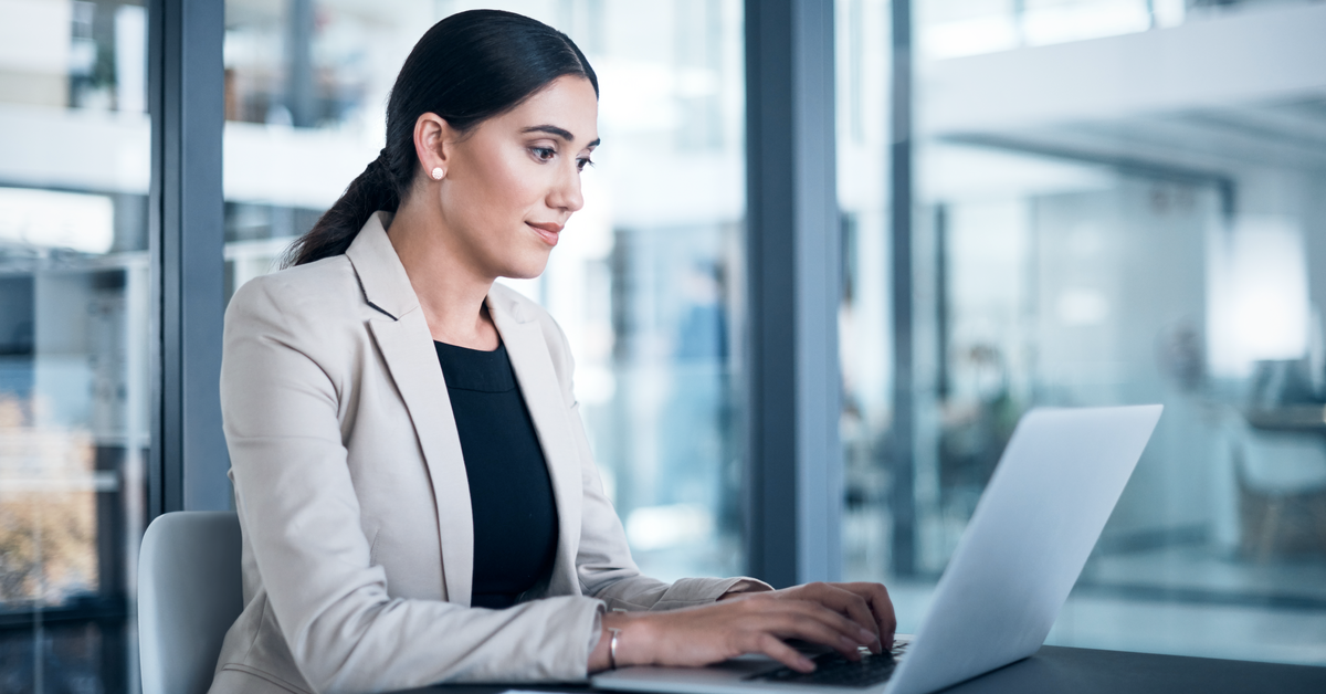 Woman working with a laptop in an office